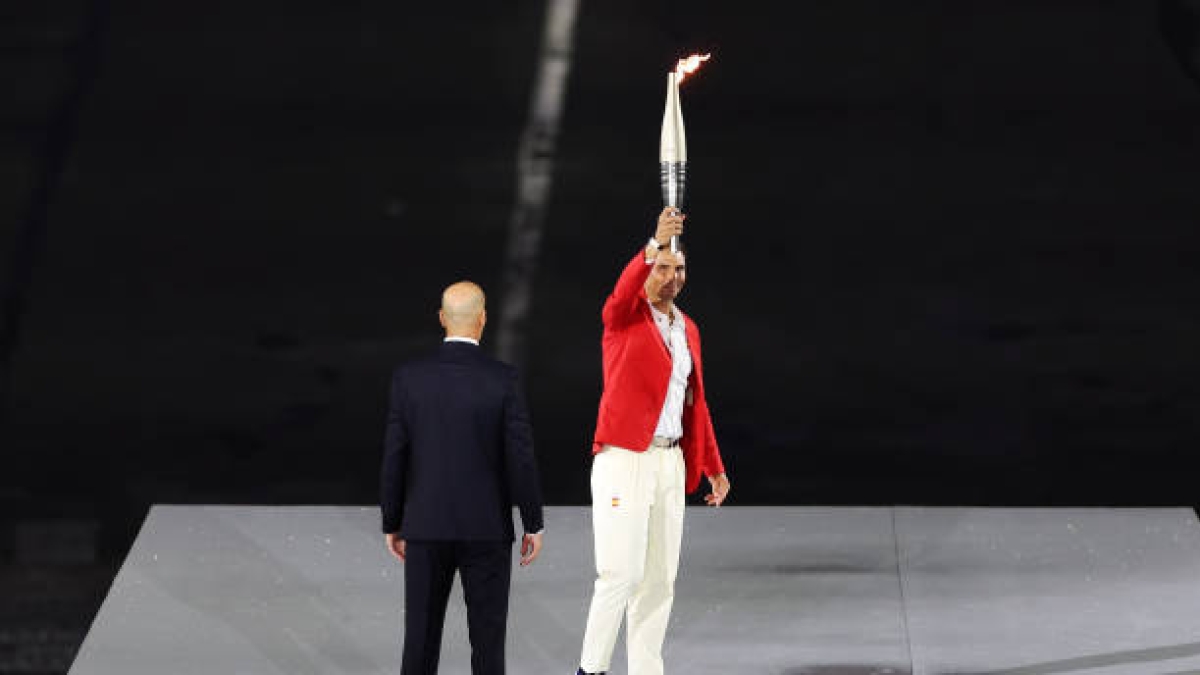 Nadal surprises the world by carrying the Olympic torch