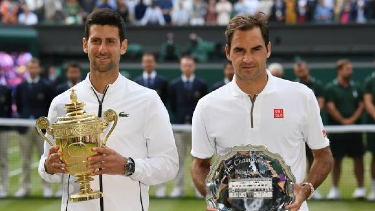 Novak Djokovic y Roger Federer en Wimbledon 2019. Foto: getty